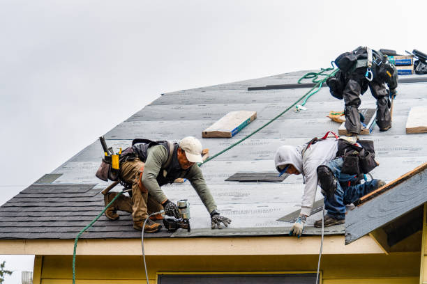 Professional Roofing technician working in Lawrence, MA